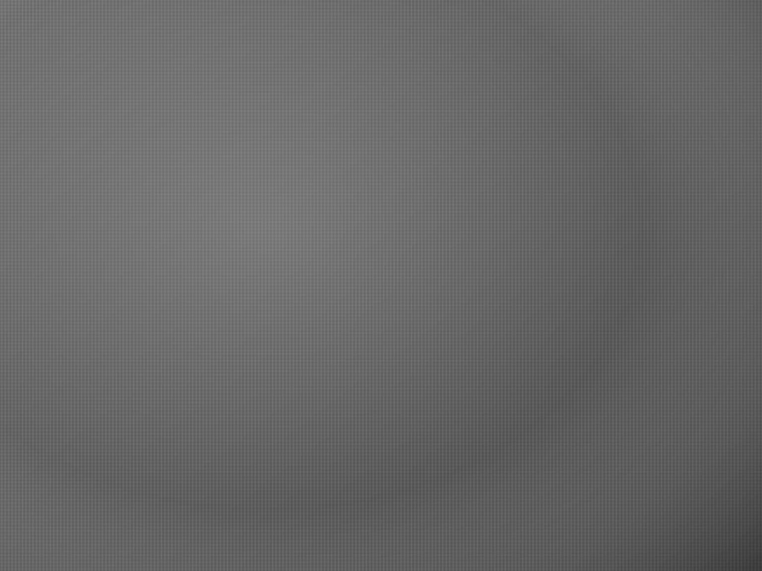 Rolls of soft knit jersey fabric in grey, black and white